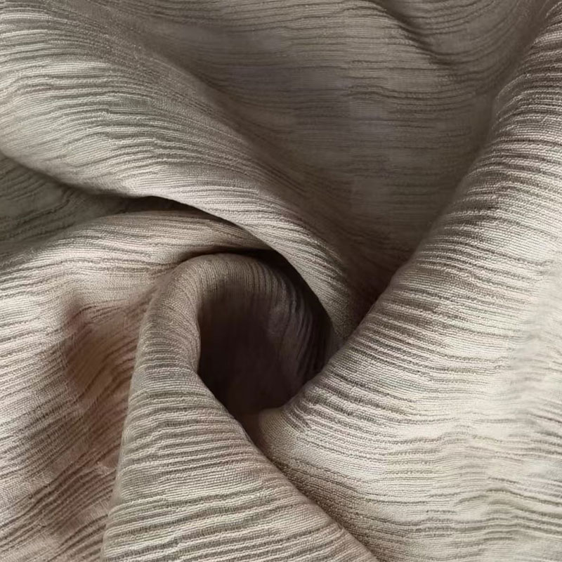 Jacquard egyszálas nylon műselyem szövet, jellegzetes redőzött textúrával